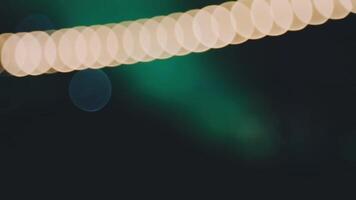 A blurry image of a lighted string of lights video