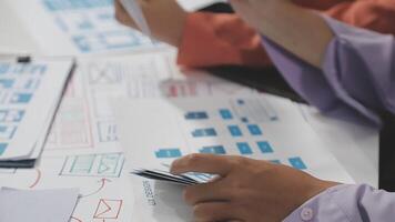 A person is working on a project with a diagram video