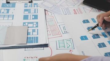 A person is working on a design project with a pen video