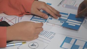 A person is working on a mobile application video