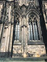 Cathedral in Cologne. The building has a lot of windows and a lot of detail photo