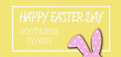 frame on a bright paper background with rabbit ears and congratulations text photo