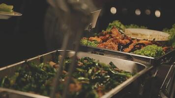 A buffet table with food and plates video