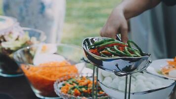 A buffet table with many different types of food video