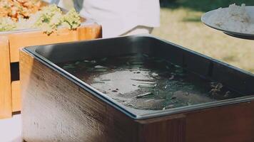 A buffet table with food and plates on it video