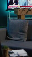 Vertical Modern apartment loft with a cozy corner and trendy decorations, comfy space decorated with electronics and a coffee table in the living room. Empty studio with minimalist furniture, chill lifestyle. video
