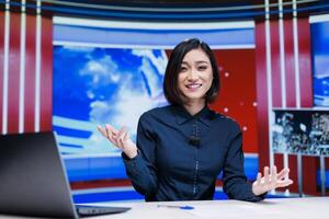 Woman host on live tv show in newsroom, discussing about global communications and international events on broadcast. Reporter creating television content with breaking news segment. photo