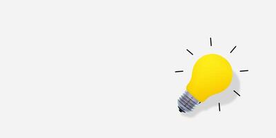 Yellow glass bulb with hard shadow, on the left side. Lightbulb on white background photo