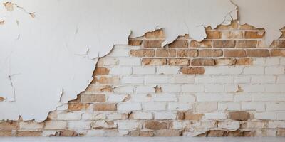 Peeling white plaster wall with exposed brick and rough texture suitable for background or design use Copy Space photo