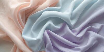 Soft flowing fabric in pastel colors creating an elegant background for creative projects and designs photo