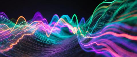 Colorful waves of light create an abstract and energetic visual display in the dark. photo