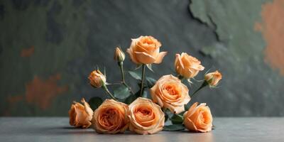 Orange roses on a dark textured background with muted colors featuring Copy Space for text insertion photo