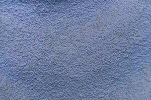 grungy and rough background in blue color with copy space photo