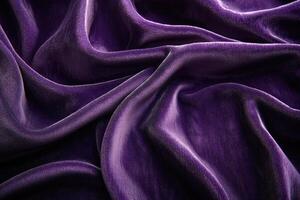 Smooth elegant purple velvet or silk fabric background showing luxurious textile photo