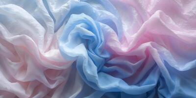 Crumpled blue and pink textured background with gradient hues creating an intriguing visual effect perfect for stylish design projects. photo