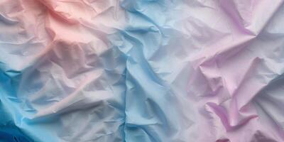 Crumpled blue and pink textured background creating depth with soft gradient hues on left and right sides enhancing visual interest and design options. photo
