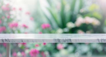 An empty marble table with a garden in the background a clean and bright background close up view of the table with a blurred background. photo