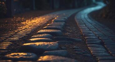 Illuminated Cobblestone Path at Night Glowing with Warm Light photo