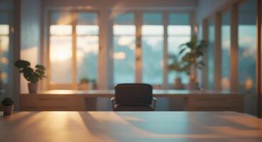 Warm light illuminates a modern workspace in a cozy indoor setting during evening hours photo