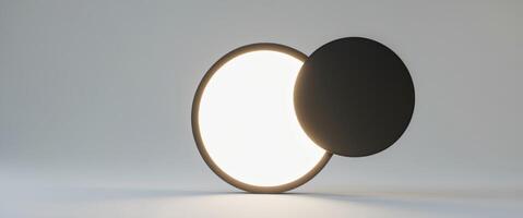 Studio image of a solar eclipse using a bright light and a black lens cap. photo
