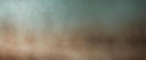 Subtle teal to light brown gradient creating a visually textured background. photo