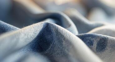 Close up soft focus denim fabric texture with blurred background photo