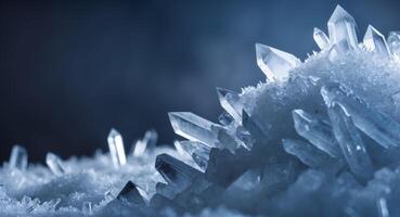 Close up of pile of ice crystals with varying sizes and dark blue background photo