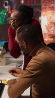 Vertical AI startup engineer leaving questions written on sticky notes for manager, needing help. Artificial intelligence tech venture employees leaving memo notes on PC to remember later, camera A video