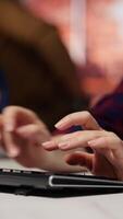 Vertical Startup engineer conducting detailed code review to fix bugs, identifying potential performance and technical issues with company software. IT worker debugging and optimizing code, camera B closeup video