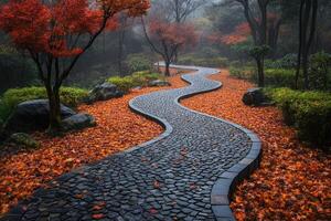 Winding cobblestone path covered with colorful autumn leaves in a serene garden photo
