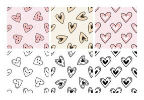 Seamless heart patterns set with colored and black and white versions vector
