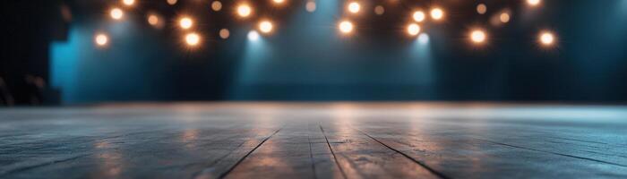 The empty stage awaits performers, with the house lights dimmed and a faint glow illuminating the area. The atmosphere hints at anticipation for an upcoming event photo