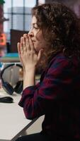 Vertical Startup employee shocked after successfully launching on stock market, generating high investment returns. Tech venture manager surprised after securing funding for pioneering software, camera A video