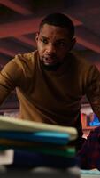 Vertical AI startup office chief technology officer overseeing woman building application. Manager assisting worker in artificial intelligence software development agency, offering advice, camera B video