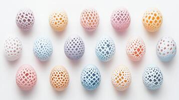 Colorful decorative eggs with geometric cutout patterns on a white background photo