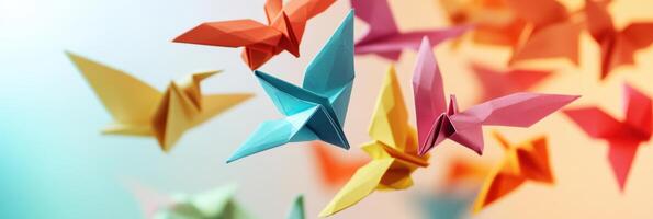 Vibrant origami paper cranes flying with colorful backgrounds in focus photo