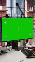 Vertical Isolated screen PC in workspace used by AI researcher working with artificial intelligence technology. Mockup computer monitor used by employee developing AI systems in tech startup, camera A video