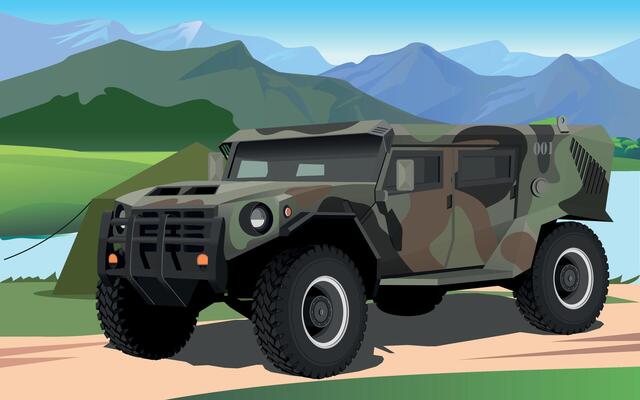 army armored command vehicle in spotted green camouflage against the background of a military base in the mountains
