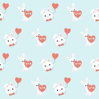 A pattern with cute rabbits and hearts vector