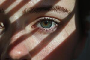 Half of the face is shrouded in deep shadows, with only one eye visible, gazing intensely at the viewer, creating a captivating and mysterious atmosphere photo