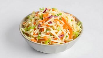 Fresh coleslaw salad with crunchy vegetables served in a bowl photo