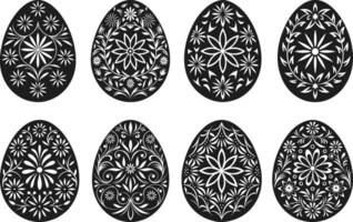 Set of Elegant Silhouette Easter Eggs with Intricate Floral Designs vector