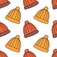 Clean Cozy autumn knit hats seamless tile pattern with warm colors and textured details concept as Warm colored knitted hats with textured details create a cozy autumn knit hats seamless vector