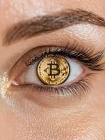 Bitcoin reflected in a womans eye, symbolizing cryptocurrency investment and the future of finance photo