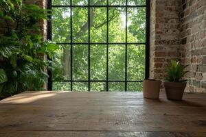 Interior design with plants on a wooden table in front of a window with a view of trees photo