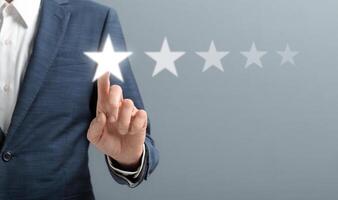 Customer survey feedback. Independent auditor evaluating excellent survey with five star rating over gray background, copy space photo