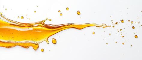 Drizzles of golden honey create intriguing splashes as they move across a white surface. The liquid forms captivating shapes and highlights the natural viscosity and color of honey. photo