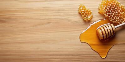 Golden honey spreads across a wooden surface, creating splashes around a honey dipper. Pieces of honeycomb rest nearby, adding to the rustic beauty of the natural sweetener. photo