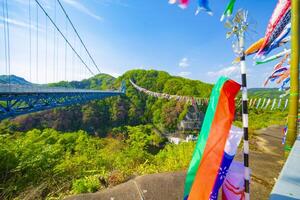 Carp streamers at Ryujin big bridge in Ibaraki daytime sunny photo