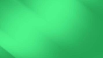 Plain green backdrop with delicate lighting suitable for presentations, text overlays, website backgrounds, or product photography with a minimalist aesthetic. video